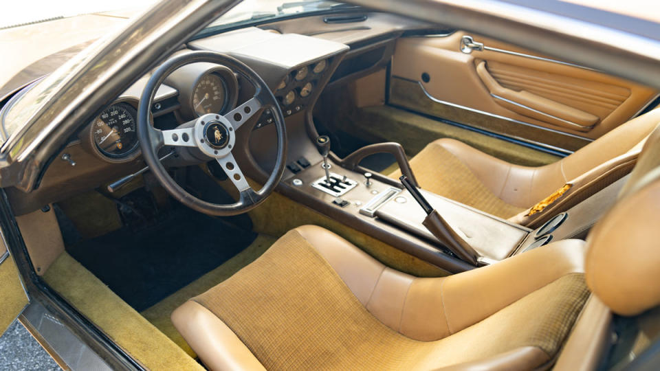 The interior of an unrestored 1970 Lamborghini Miura P400 S.