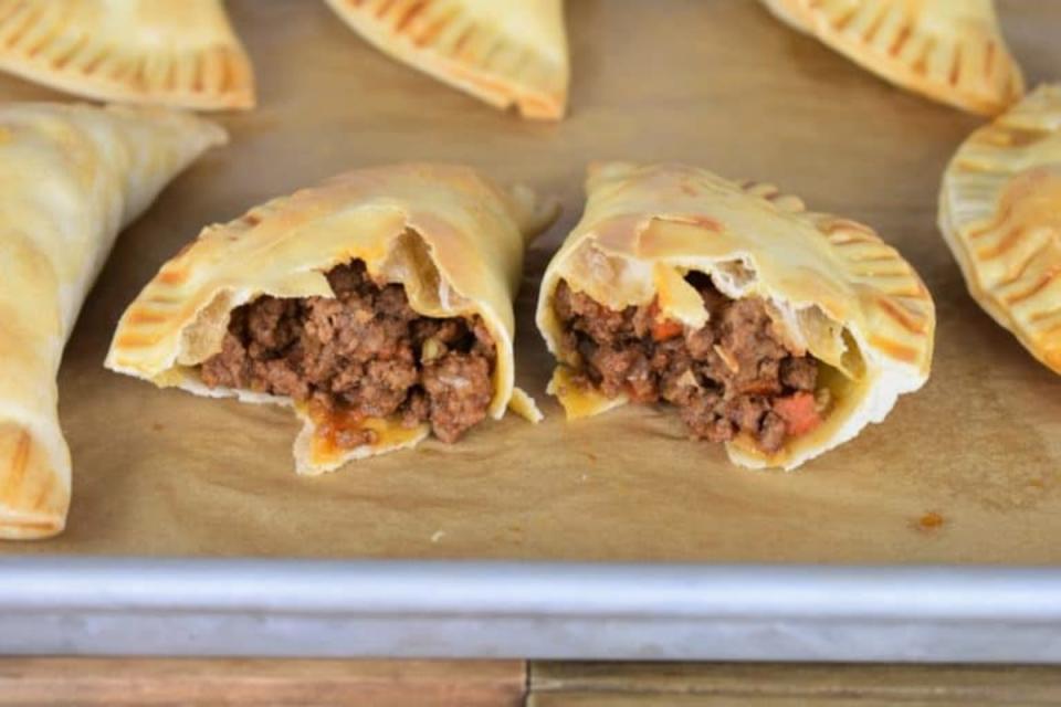 <p>Cook 2 Eat Well</p><p> These beef empanadas are baked not fried.</p><p><strong>Get the recipe:</strong> <a href="https://www.cook2eatwell.com/baked-beef-empanadas/" rel="nofollow noopener" target="_blank" data-ylk="slk:Baked Beef Empanadas;elm:context_link;itc:0;sec:content-canvas" class="link ">Baked Beef Empanadas</a></p>