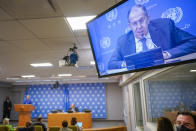 Russian Foreign Minister Sergey Lavrov is seen on a video screen as he speaks to reporters during a news conference during 76th session of the United Nations General Assembly, Saturday, Sept. 25, 2021 at United Nations headquarters. (AP Photo/Mary Altaffer)