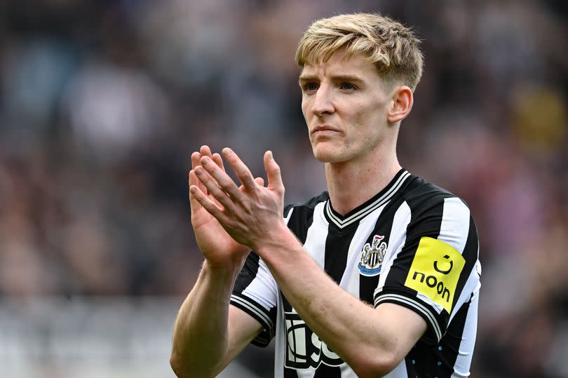 Anthony Gordon of Newcastle United claps the fans