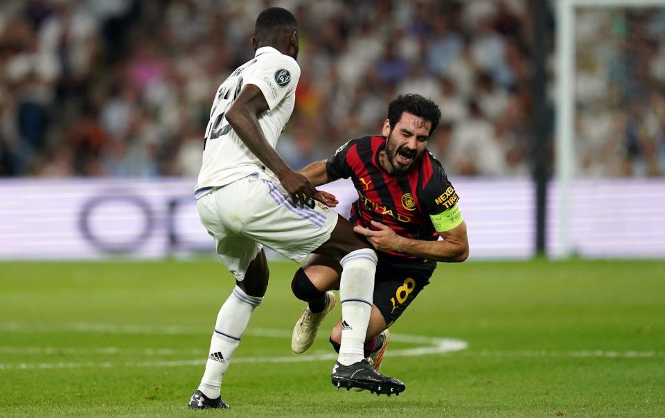 Antonio Rudiger blocks off Manchester City's Ilkay Gundogan - PA/Nick Potts