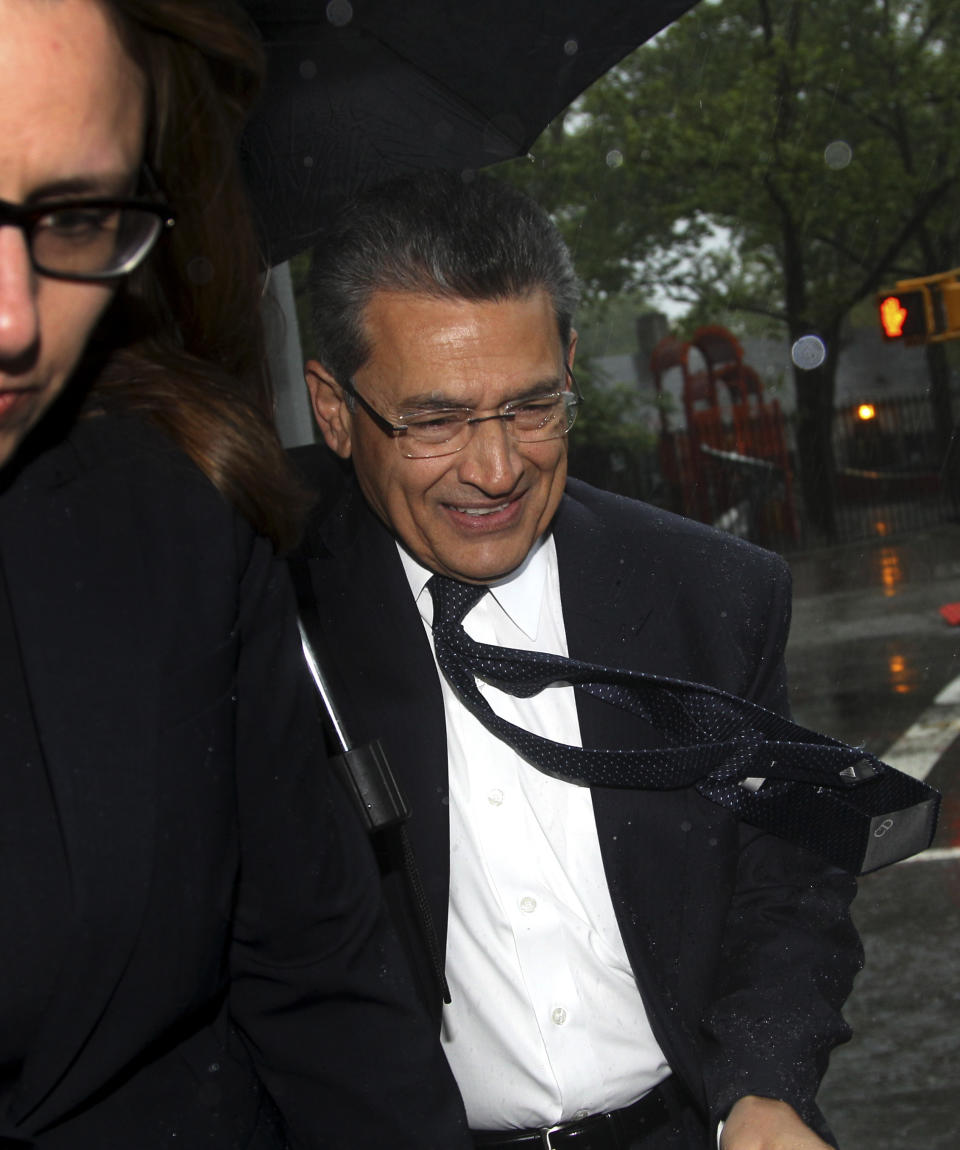 Rajat Gupta enters a federal courthouse in New York, Monday, May 21, 2012. Prosecutors will try to convince a jury that an intercepted call shows Gupta was providing inside tips that gave Raj Rajaratnam an illegal edge in massive stock maneuvers. Defense lawyers say they'll argue Gupta was a straight-shooter who only shared public information with the billionaire hedge fund boss, as devoted to raising money for charity as to Goldman's bottom line. Jury selection is scheduled to begin Monday in federal court in Manhattan. The trial is scheduled to last up to four weeks. (AP Photo/Seth Wenig)