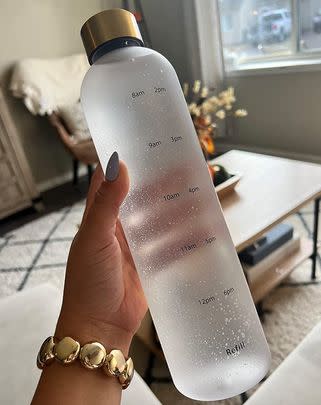 A sleek time-marked water bottle