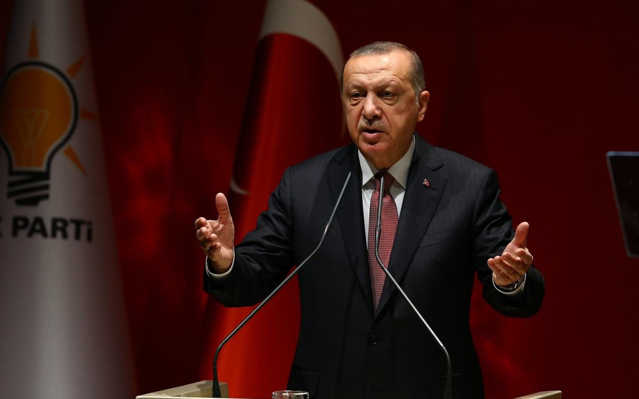 Turkey's President and ruling AK Party Chairman Recep Tayyip Erdogan delivers a speech - Anadolu