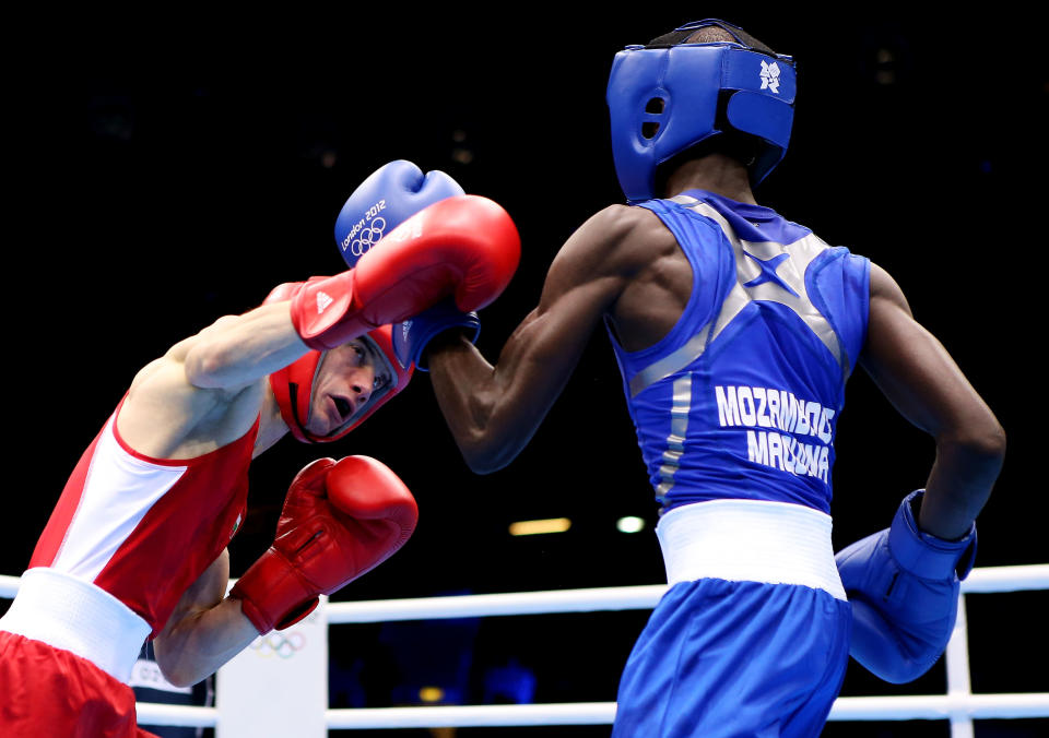 Aleksander Aleksandrov of Bulgaria n(L) in action with Juliano Fernando Gento Maquina of Mozambique on Day 4 of the London 2012 Olympic Games at ExCeL on July 31, 2012 in London, England. (Photo by Scott Heavey/Getty Images)