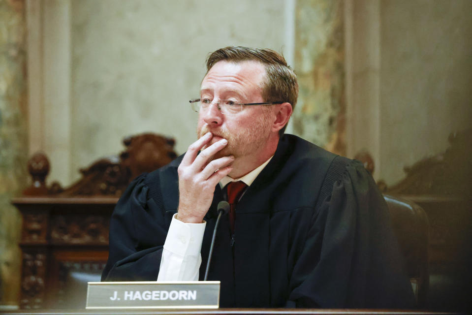 Wisconsin Supreme Court Justice Brian Hagedorn listens to arguments during a redistricting hearing at the Wisconsin state Capitol Building in Madison, Wis., on Tuesday, Nov. 21, 2023. (Ruthie Hauge/The Capital Times via AP, Pool)