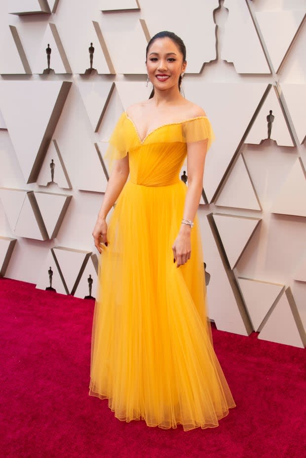 <p>The <em>Crazy Rich Asian </em>star’s custom Atelier Versace gown had a sweetheart neckline with a crystal trim and <a href="https://parade.com/936221/marynliles/romantic-love-quotes/" rel="nofollow noopener" target="_blank" data-ylk="slk:romantic;elm:context_link;itc:0;sec:content-canvas" class="link ">romantic</a> pleats in a gorgeous canary yellow. It’s one of those dresses <em>made</em> for twirling that every girl dreams of.</p>