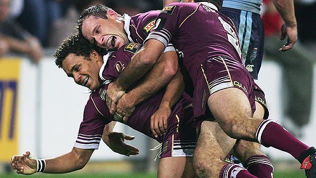 Bowen swamped by team-mates after scoring from the intercept. Pic: Getty