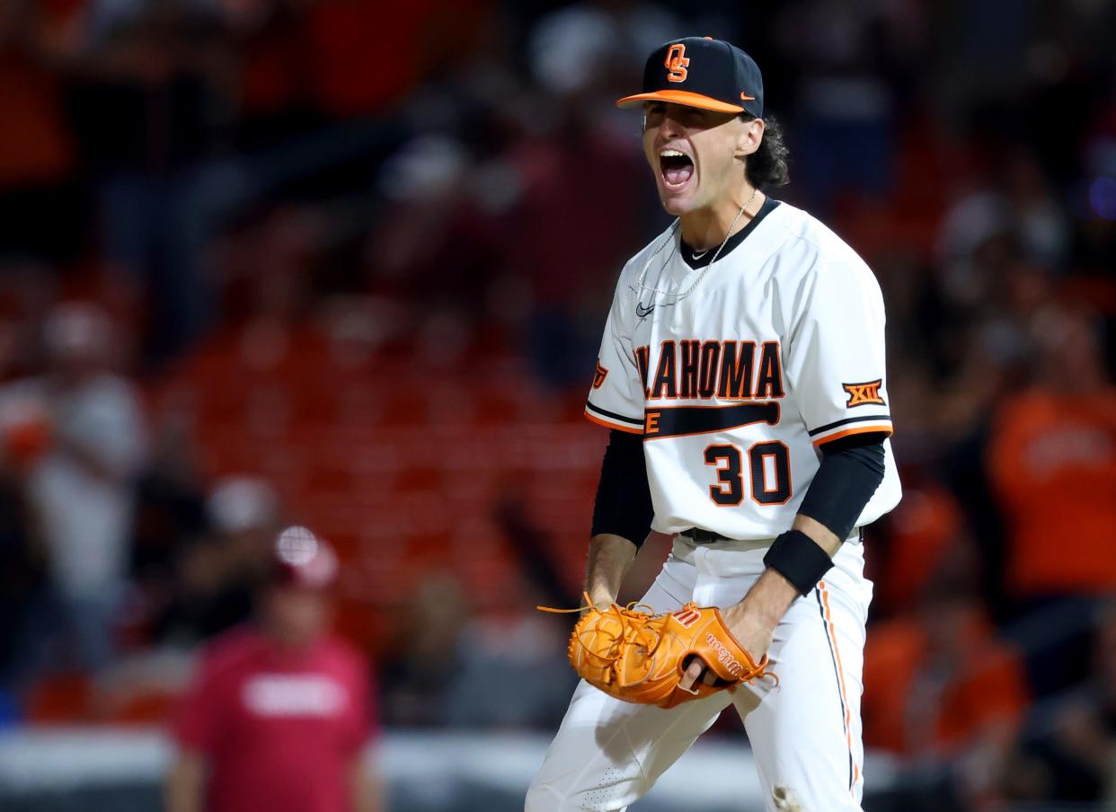 Oklahoma State pitcher Tommy Molsky (30) celebrates the last out of the Cowboys' 9-6 home victory Friday against Oklahoma. The Cowboys took two of three in the series at O'Brate Stadium in Stillwater, Oklahoma.