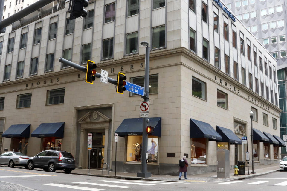 FILE - This May 6, 2020, file photo shows a Brooks Brothers store in Pittsburgh. The fashion retailer Brooks Brothers is filing for bankruptcy protection. The company that says it's put 40 U.S. presidents in its suits survived a pair of world wars and navigated through casual Fridays and a loosening of dress standards even on Wall Street, but the coronavirus pandemic pushed the 200-year-old company into seek Chapter 11 protection Wednesday, July 8, 2020. (AP Photo/Gene J. Puskar, File)