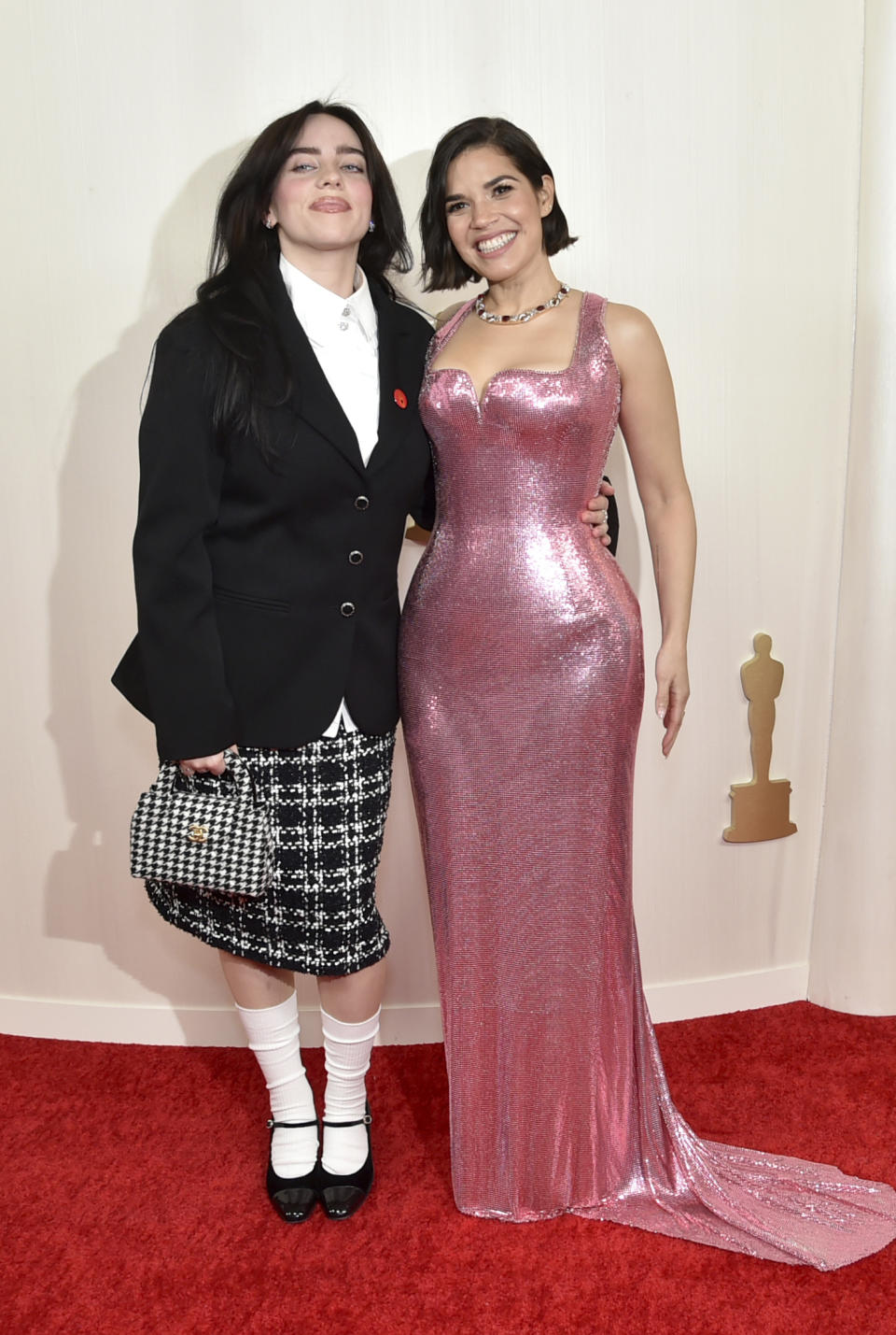 Billie Eilish, left, and America Ferrera arrive at the Oscars on Sunday, March 10, 2024, at the Dolby Theatre in Los Angeles. (Photo by Richard Shotwell/Invision/AP)