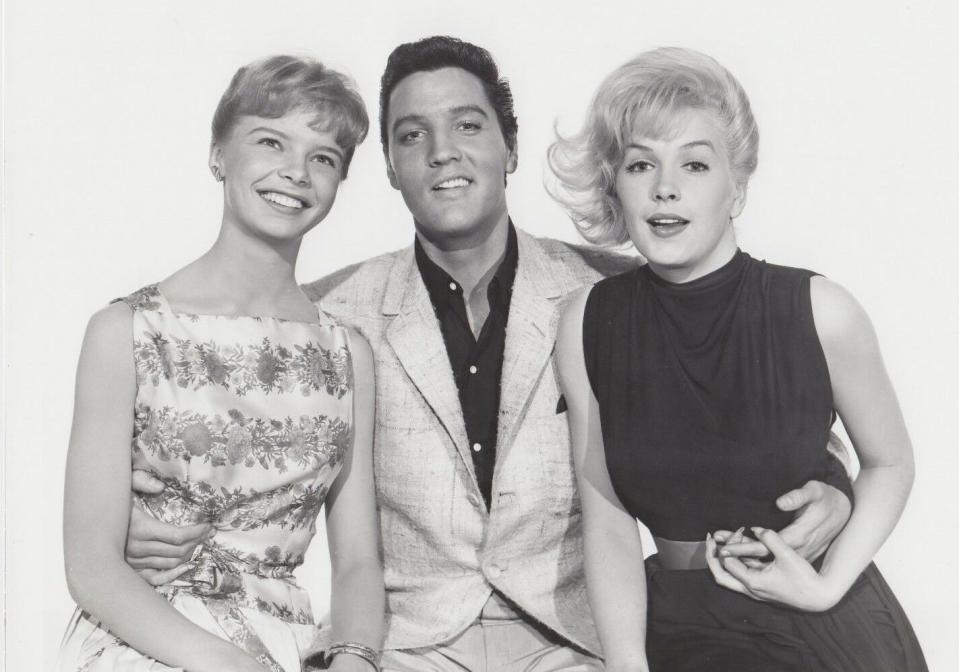 Stella Stevens (right) with Laurel Goodwin and Elvis Presley in a publicity portrait for "Girls! Girls! Girls!"