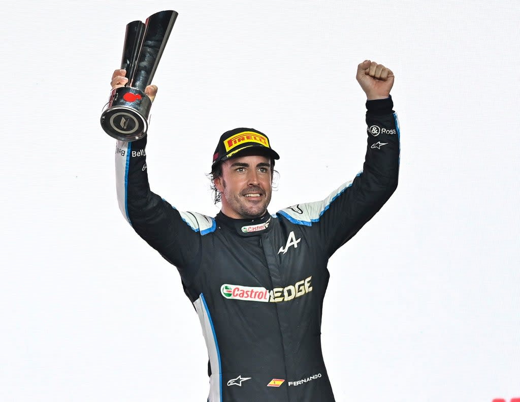 Alonso was delighted after holding off a challenge from Sergio Perez to take third (EPA)