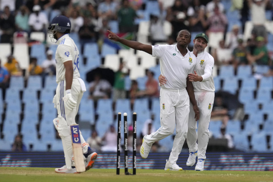 South Africa's bowler Kagiso Rabada, centre, celebrates after bowling India's Shreyas Iyer for 31 runs during the first day of the Test cricket match between South Africa and India, at Centurion Park, South Africa, Tuesday, Dec. 26, 2023. (AP Photo/Themba Hadebe)