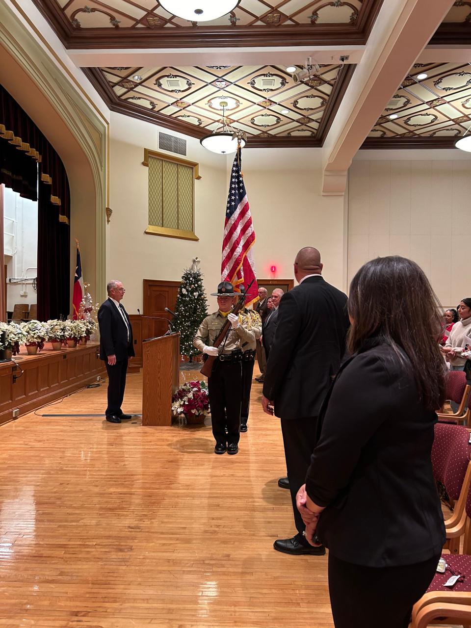 The Potter County Sheriff's Office Color Guard takes part in the 21st annual Tree of Angels Ceremony, held Friday evening at the Santa Fe Building Auditorium.
