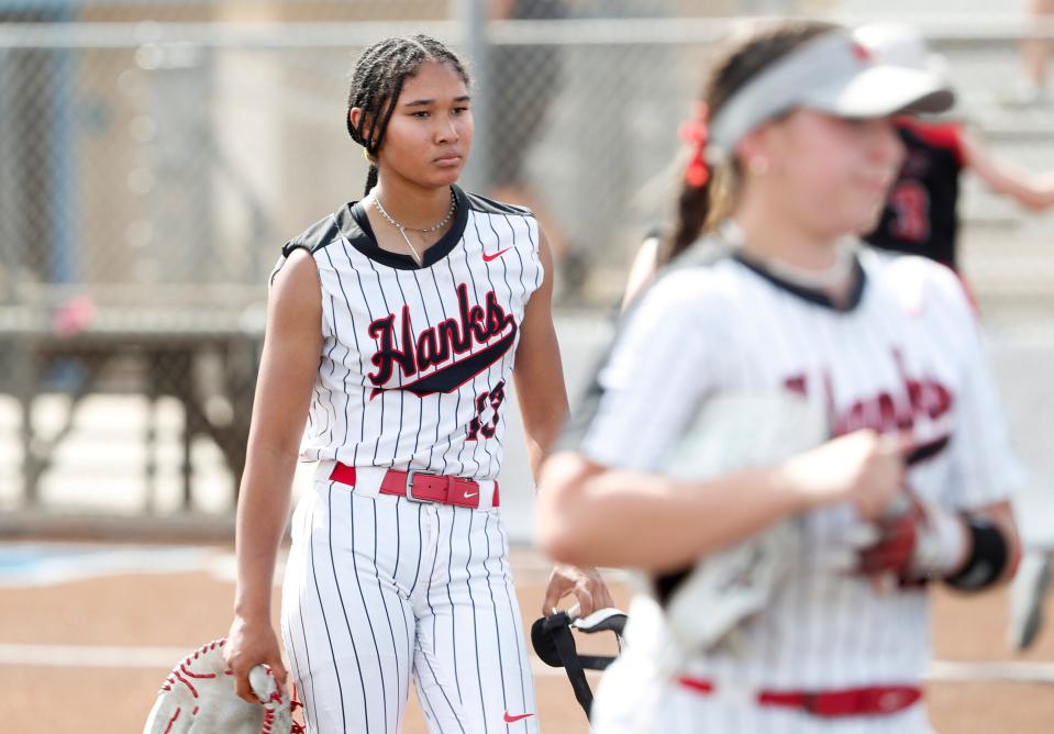 Hanks High School's Desirae Spearman reacts after losing to Colleyville Heritage High School in the first game of the best of three series of the 1-5A semifinals game at Midland Greenwood High School on Friday, May 19, 2023. Hanks lost 2-4 in the