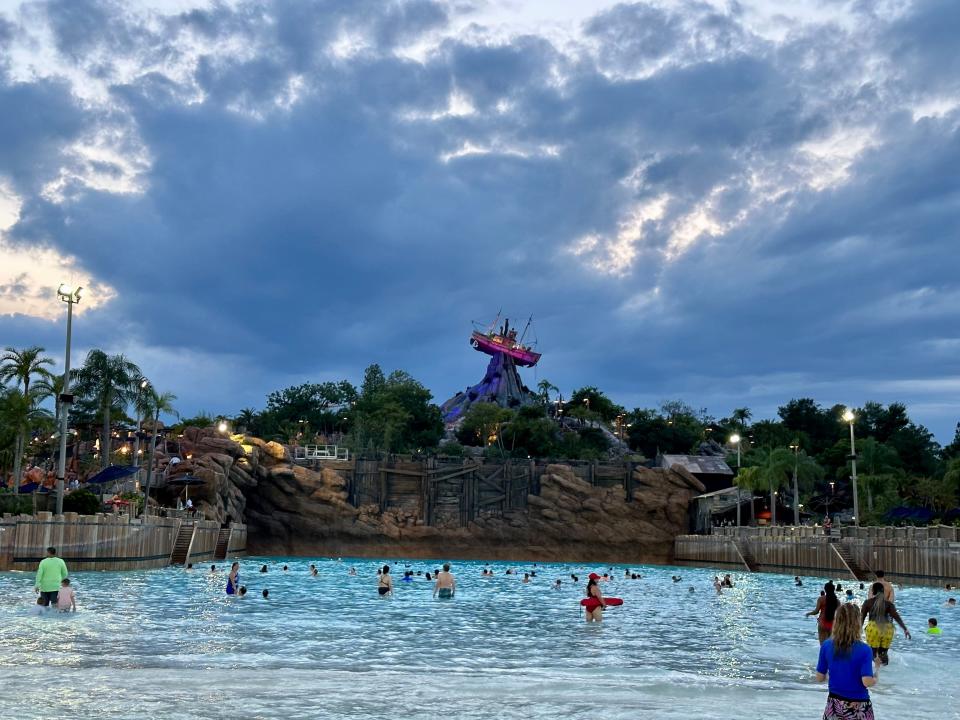 typhoon lagoon pool area with a few people in it