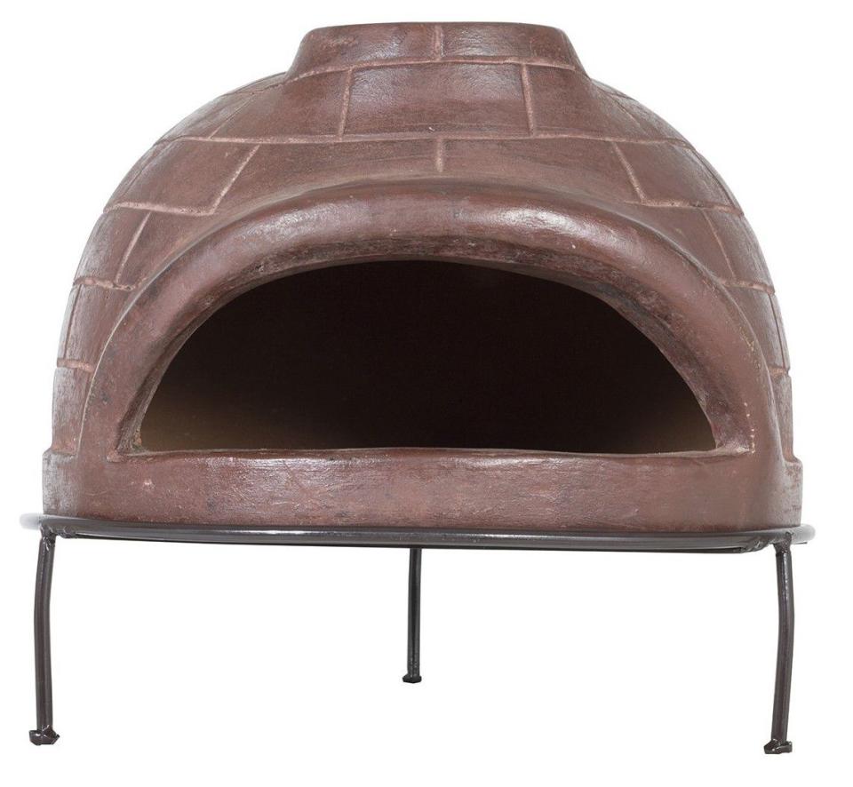 <p>Handmade from clay and finished with a red brick effect, this quirky pizza oven is portable and will help you create tasty homemade pizzas. The grill is not included.</p><p><strong>£79.99, Argos</strong> <a rel="nofollow noopener" href="https://www.argos.co.uk/product/6014605" target="_blank" data-ylk="slk:BUY NOW;elm:context_link;itc:0;sec:content-canvas" class="link ">BUY NOW</a></p>