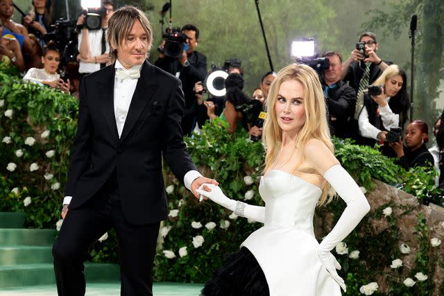 <p>Dimitrios Kambouris/Getty</p> Keith Urban and Nicole Kidman