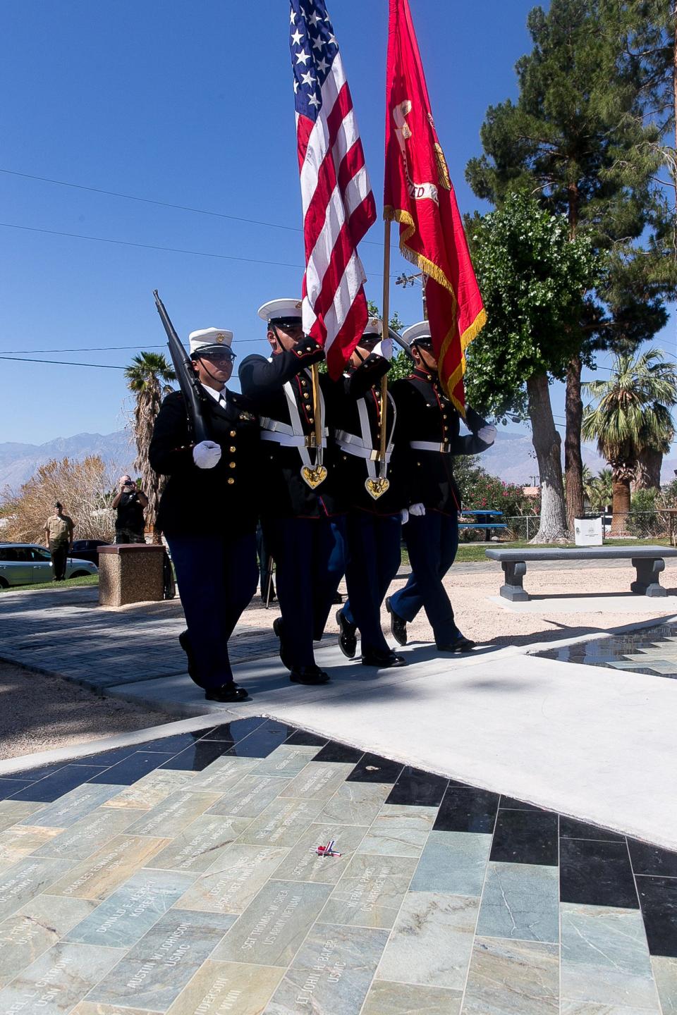 The Desert Hot Springs Junior ROTC present Colors during a ceremony held at Veterans' Memorial Park in Desert Hot Springs on Monday, May 26, 2014.