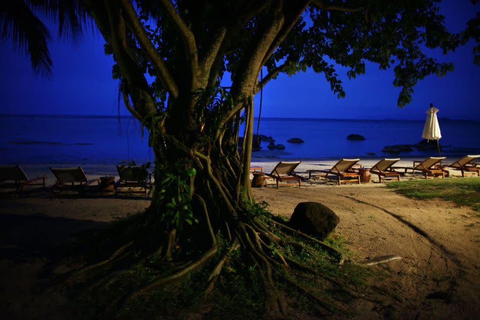 The night sky is seen along a beach at the Kamalaya Wellness Sanctuary in Koh Samui, Thailand.