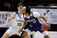 FILE - Western Carolina forward Xavier Cork (13) drives the ball against Citadel forward Hayden Brown (33) in the first half of the first round NCAA men's college basketball championship game for the Southern Conference tournament in Asheville, N.C., in this Friday, March 5, 2021, file photo. TCU has eight transfers this season, including Xavier Cork, who shot 64% at Western Carolina in the Southern Conference. (AP Photo/Kathy Kmonicek, File)