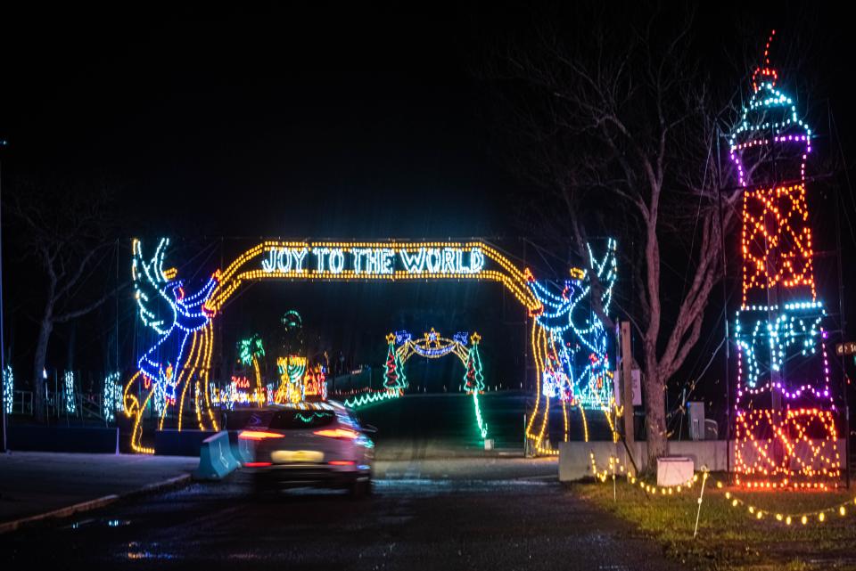 Cars drive through the holiday light show at the PNC Bank Arts Center in Holmdel in 2018.