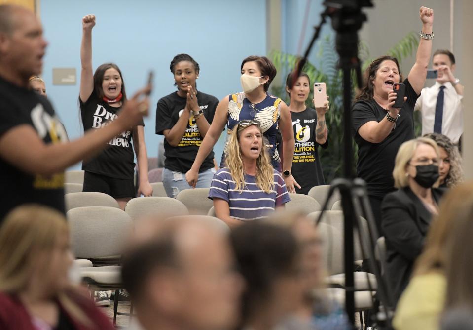 Audience members joined Ben Frazier, the founder of the Northside Coalition of Jacksonville in chanting "Allow teachers to teach the truth" during public comments on the state's plans to ban the teaching of critical race theory in state public schools.