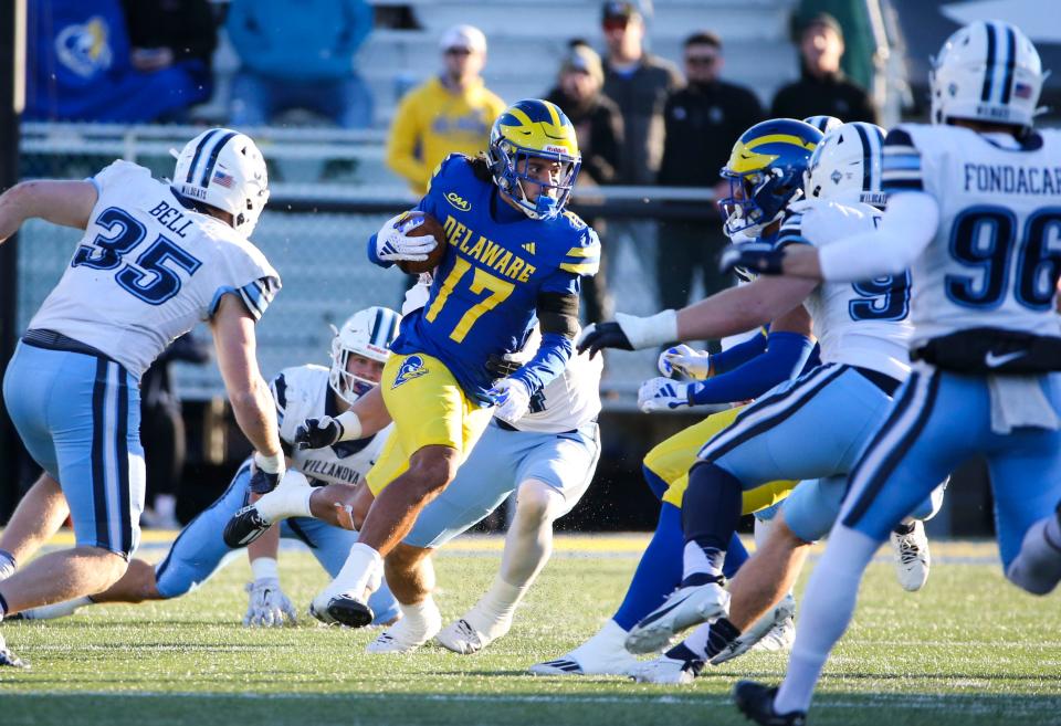 Delaware wide receiver Jourdan Townsend returns a kick in the fourth quarter of the Blue Hens' 35-7 loss at Delaware Stadium, Saturday, Nov. 18, 2023.