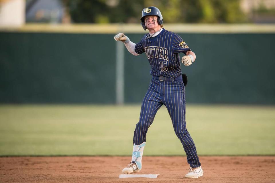 Sutter Huskies batter Andrew Hanson (15) celebrates hitting a double and RBI to rally and put the Huskies on the board against Bradshaw Christian during the sixth inning at the CIF Sac-Joaquin Section Division V high school baseball championship game Tuesday, May 23, 2023, at Sacramento City College.