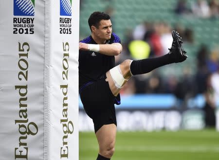 Dan Carter of New Zealand warms up before the Rugby World Cup final between New Zealand and Australia at Twickenham in London, Britain October 31, 2015. REUTERS/Henry Browne