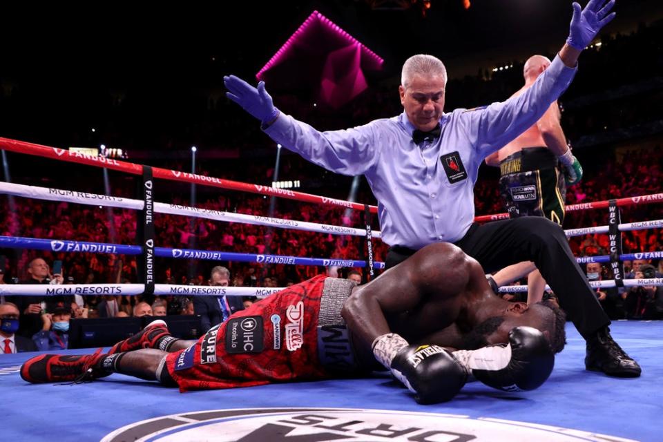 Referee Russell Mora calls the fight after Tyson Fury knocked out Deontay Wilder in the 11th round (Getty)