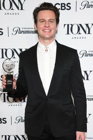 <p>Kristina Bumphrey/Variety via Getty</p> Jonathan Groff with his trophy at the 2024 Tony Awards