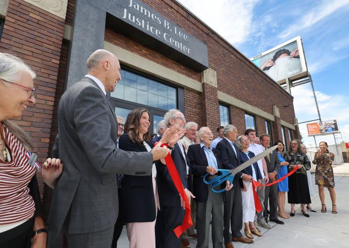 A ribbon is cut by Robert Graham, a member of the Florence J. Gillmor Foundation board of directors, at the James.  B. Lee Justice Center in Salt Lake City on Thursday, June 22, 2023. |  Jeffrey D. Allred, Deseret News