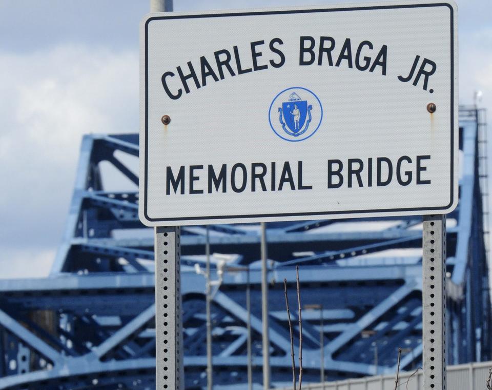 This dedication sign is next to Interstate 195 westbound, with its namesake looming in the background.