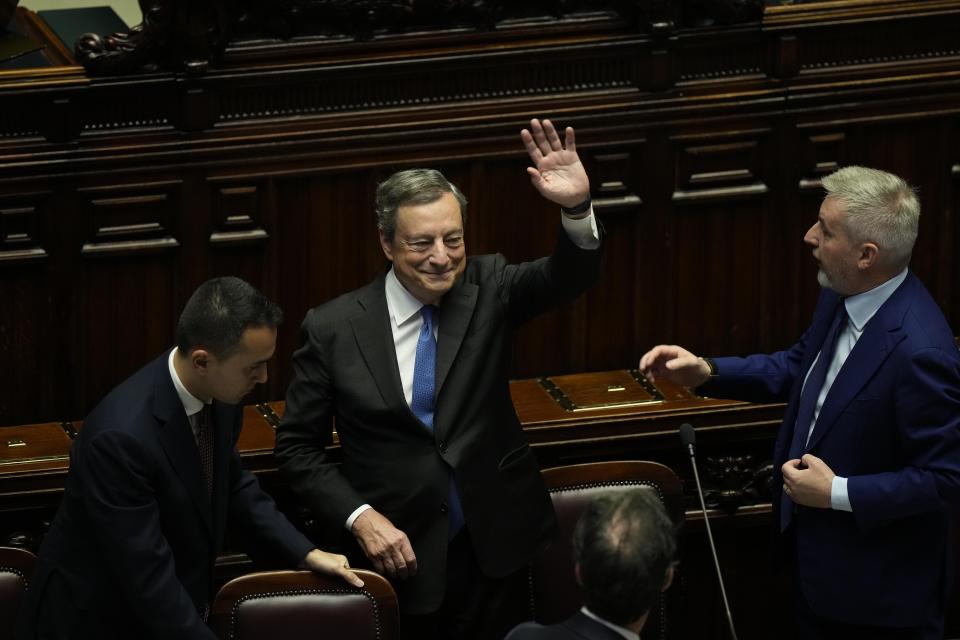 Italian Premier Mario Draghi waves to lawmakers at the end of his address at the Parliament in Rome, Thursday, July 21, 2022. Premier Mario Draghi's national unity government headed for collapse Thursday after key coalition allies boycotted a confidence vote, signaling the likelihood of early elections and a renewed period of uncertainty for Italy and Europe at a critical time. (AP Photo/Andrew Medichini)