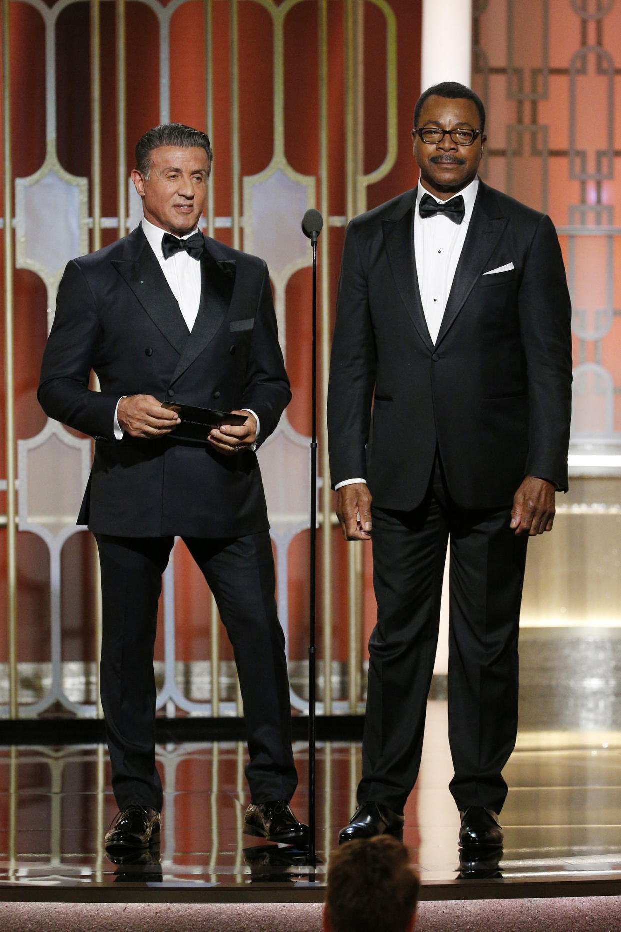 Sylvester Stallone and Carl Weathers, who co-starred in the 1977 Golden Globe Award-winning film 