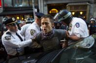 A protester is detained by New York police during a demonstration calling for social, economic and racial justice, in the Manhattan borough of New York City April 29, 2015. The demonstration was being held to support Baltimore's protest against police brutality following the April 19 death of Freddie Gray in police custody. (REUTERS/Andrew Kelly)