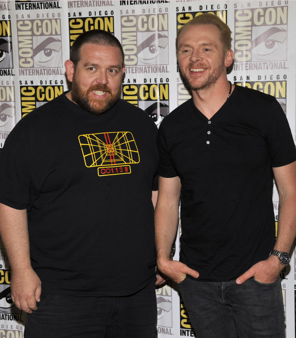 File - In this July 19, 2013 file photo, Nick Frost, left, and Simon Pegg attend "The World's End" press line on Day 3 of Comic-Con International in San Diego. It’s not the end of the world, but “The World’s End” marks a creative conclusion for actors Pegg, Frost, and director, Edgar Wright. The threesome behind “Shaun of the Dead” and “Hot Fuzz” say “The World’s End,” in theaters Friday, Aug. 23, 2013, completes a trilogy. (Photo by Chris Pizzello/Invision/AP, File)