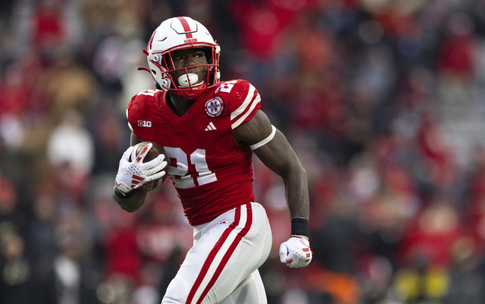 Nebraska's Emmett Johnson (21) runs in a touchdown against Purdue during the second half of an NCAA college football game Saturday, Oct. 28, 2023, in Lincoln, Neb. (AP Photo/Rebecca S. Gratz)