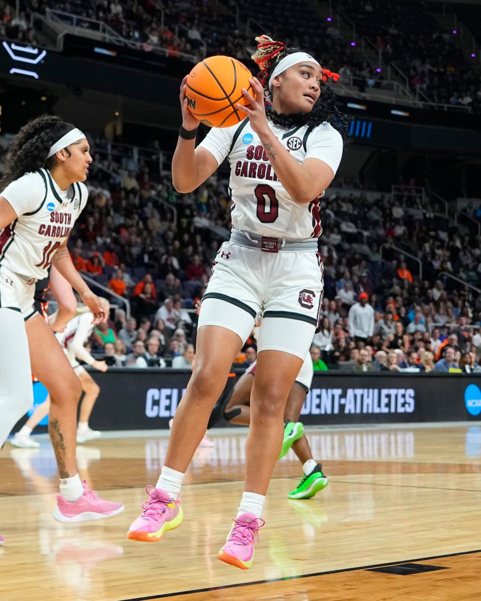 Te-Hina Paopao grabs a rebound during South Carolina's Elite Eight win.