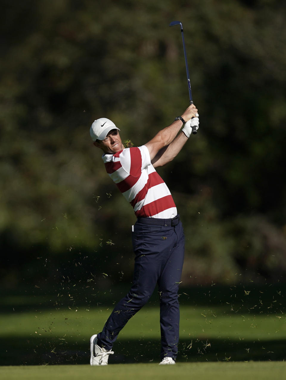 Rory McIlroy, of Northern Ireland, hits his second shot on the 13th hole during the second round of the Genesis Invitational golf tournament at Riviera Country Club, Friday, Feb. 14, 2020, in the Pacific Palisades area of Los Angeles. (AP Photo/Ryan Kang)