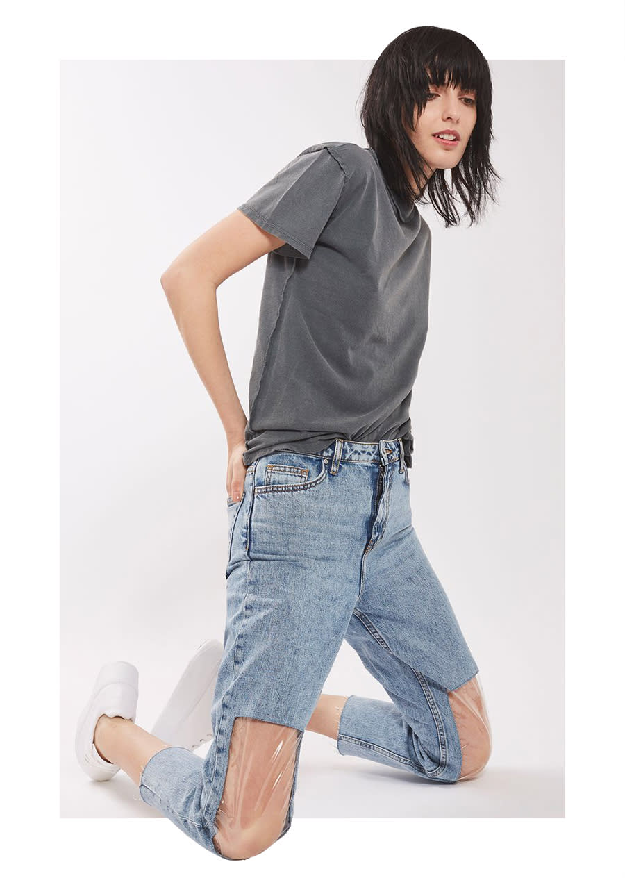 Topshop is selling jeans with plastic knee panels. (Photo: Topshop)