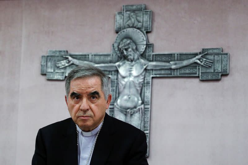 Cardinal Giovanni Angelo Becciu speaks to the media in Rome