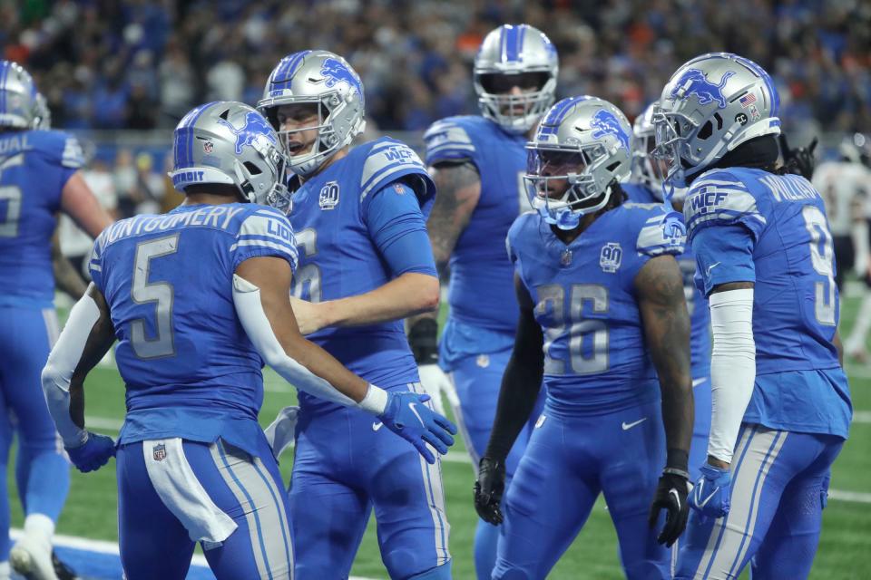Left to right: Lions running back David Montgomery, quarterback Jared Goff, running back Jahmyr Gibbs and receiver Jameson Williams celebrate the go-ahead 1-yard touchdown by Montgomery vs. the Bears with 29 seconds remaining at Ford Field, Sunday, Nov. 19, 2023.