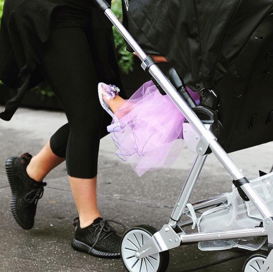 Oh, you know — just being pushed around NYC while wearing a purple tutu and matching glittery heels. #Princess. (Photo: Instagram)