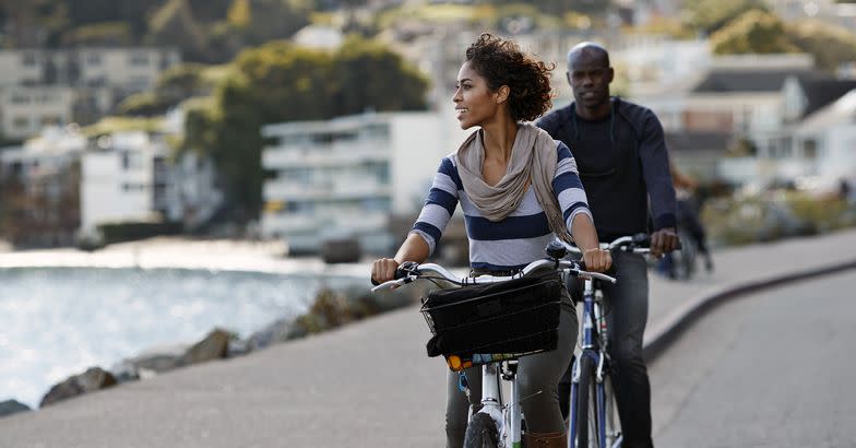 Couple riding bikes in the small town Sausalito