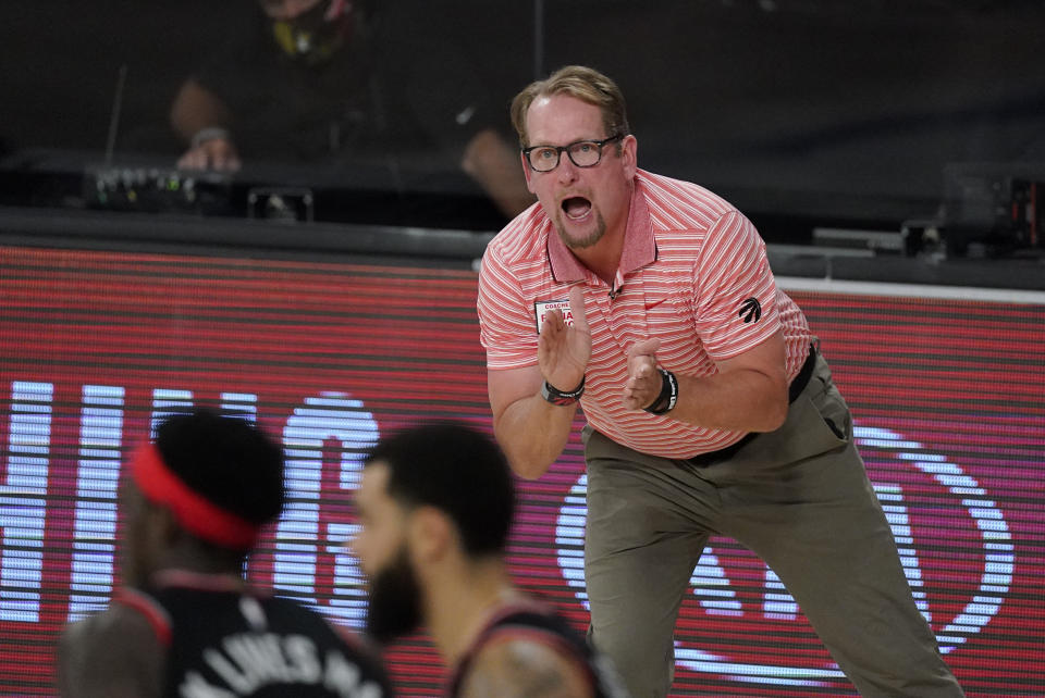 Toronto Raptors' head coach Nick Nurse reacts on the bench during the second half of an NBA conference semifinal playoff basketball game against the Boston Celtics Saturday, Sept. 5, 2020, in Lake Buena Vista, Fla. (AP Photo/Mark J. Terrill)