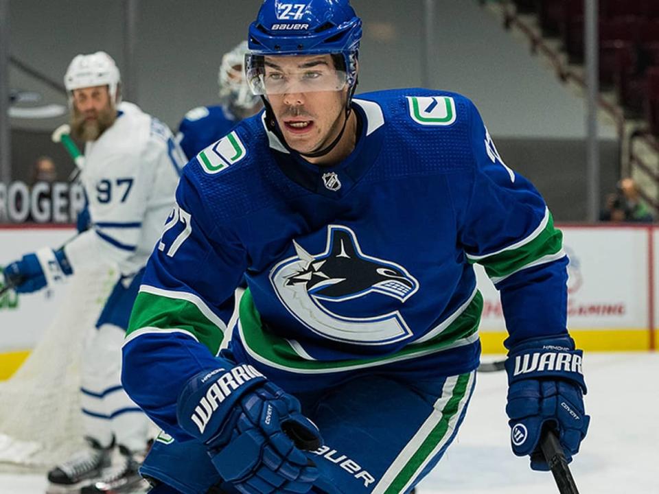 The Canucks on Monday say they mutually agreed with Travis Hamonic for the defenceman to take a leave of absence for personal reasons. Hamonic didn't report to training camp in September after playing 38 games in his first season with Vancouver. (Bob Frid-USA TODAY Sports via Reuters - image credit)