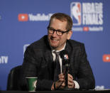 FILE - In this June 7, 2019 file photo Toronto Raptors coach Nick Nurse smiles during a news conference in Oakland, Calif. Nurse's improbable path to the NBA basketball title began as a guard for Carroll Kuemper High in the middle of Iowa way back in the 1980s. Nurse returned to his home state this weekend for a celebration of a career — a weekend that included a family reunion on a farm outside of tiny Churdan, Iowa, where his recently deceased mother was raised. Nurse was feted by local celebrities and scores of folks he grew up with in Carroll on Sunday, June 30, 2019 at the Wild Rose Casino in Jefferson. (AP Photo/Ben Margot, file)